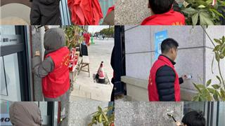 龙港市新城联合党委开展小广告专项整治行动